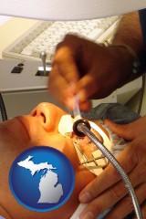 michigan map icon and lasik laser eye surgery for vision correction