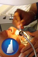 new-hampshire map icon and lasik laser eye surgery for vision correction